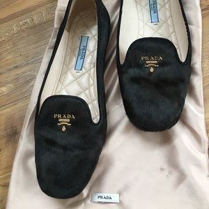 Prada flat shoes.